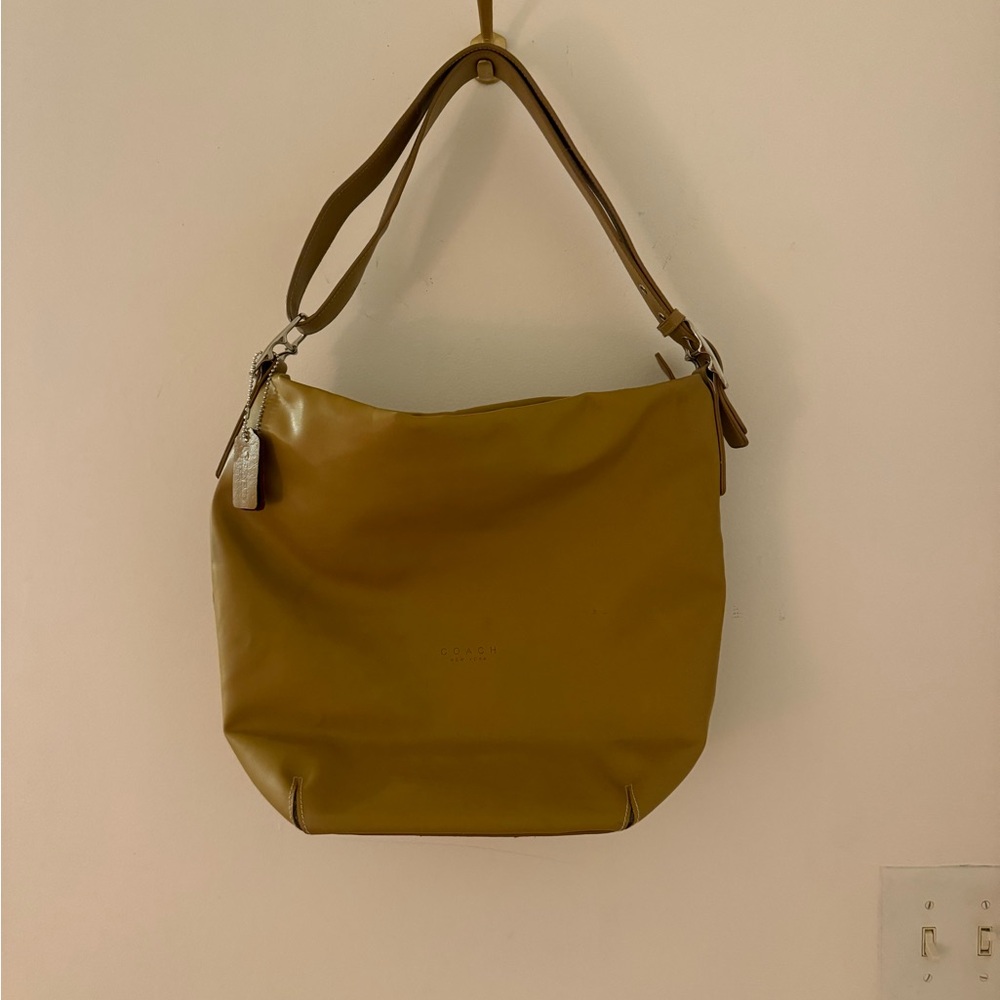 Coach leather shoulder bag tan buckle strap